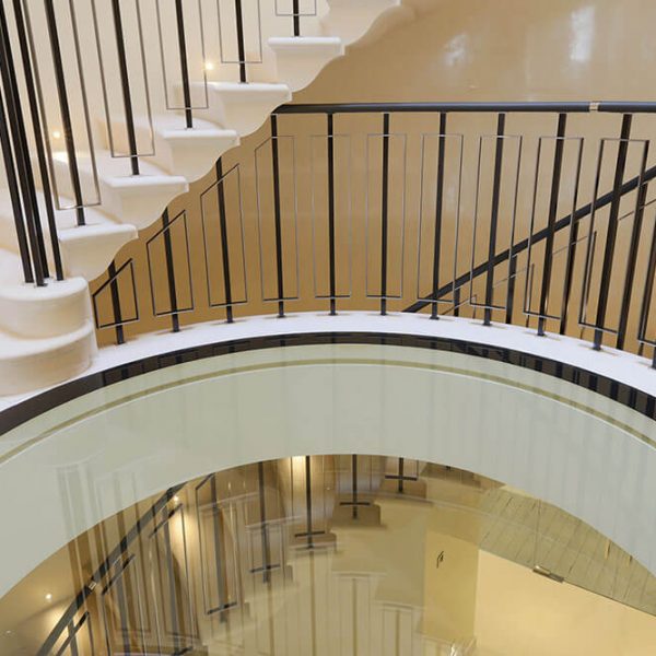 Elliptical-Cantilevered-Staircase-in-Massangis-Beige-Clair