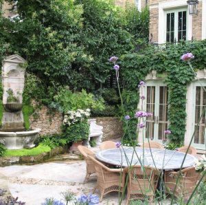 Romantic-garden-with-window-surrounds,-hard-lanscaping-and-furniture-in-a-range-of-stones-and-treatments-(2)